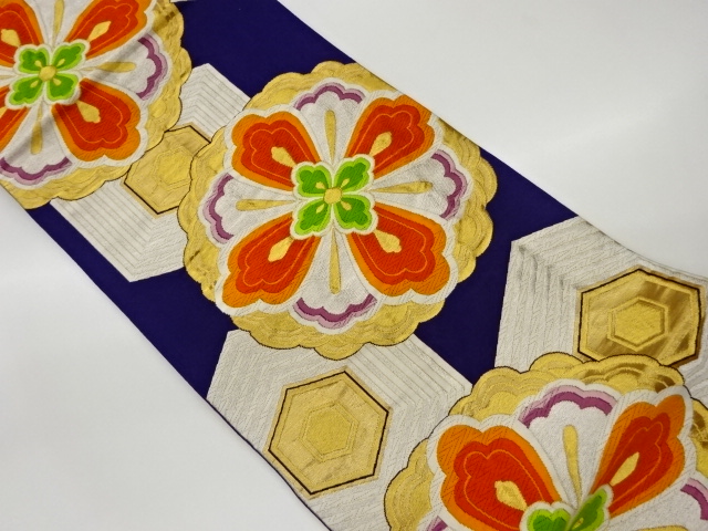 華文に亀甲模様織出し袋帯